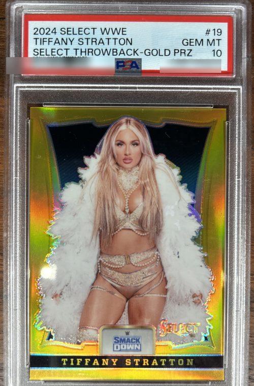 A PSA-graded Tiffany Stratton 2024 Select WWE card in a sealed slab