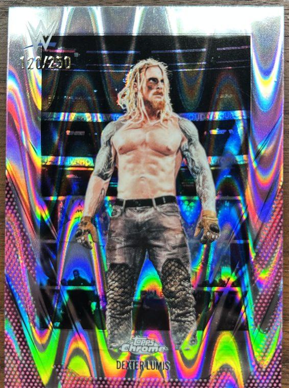 A raw Dexter Lumis Topps Chrome card with rainbow wave foil, lying on a table